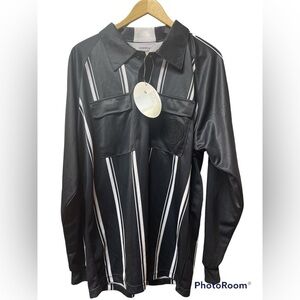 KWIK goal referee jersey.